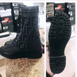 Fendi-Black leather biker boots with stretch fabric